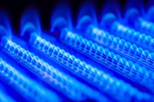 Propane flame inside of gas boiler furnace Propane flame inside of gas boiler furnace